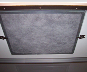 Install new filter and re-latch filter clips