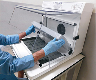 Remove plastic wrap from carbon filter & snap into place using filter clips